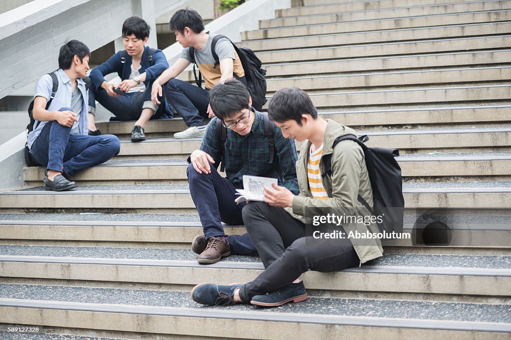 Five Japanese Students Having Fun on Staircase, Campus, Kyoto, Japan