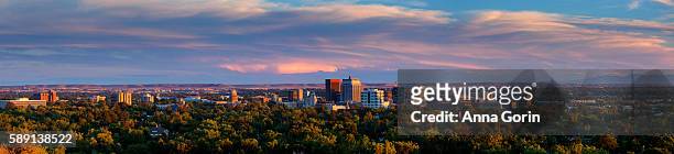 panoramic summer sunset over downtown boise idaho ("city of trees") viewed from camels back park - boise stock pictures, royalty-free photos & images