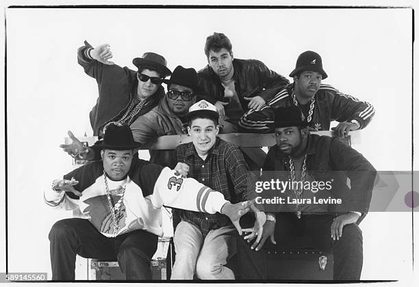 Mike D, DMC, MCA, Jam Master Jay; Front Row: DJ Hurricane, Ad-Rock, Run.