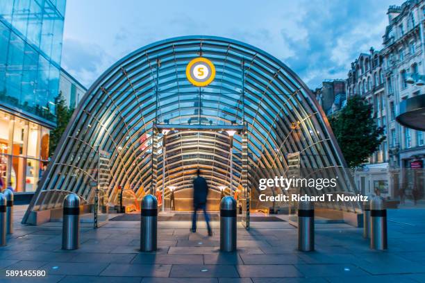 commuter on subway escalator - underground station stock pictures, royalty-free photos & images