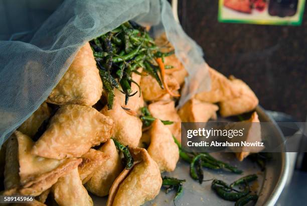 samosas and green chiles - samosa stock pictures, royalty-free photos & images