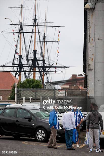 The Trincomalee, an historic floating warship permanently moored in Hartlepool marina, provides the backdrop as supporters of Hartlepool United make...