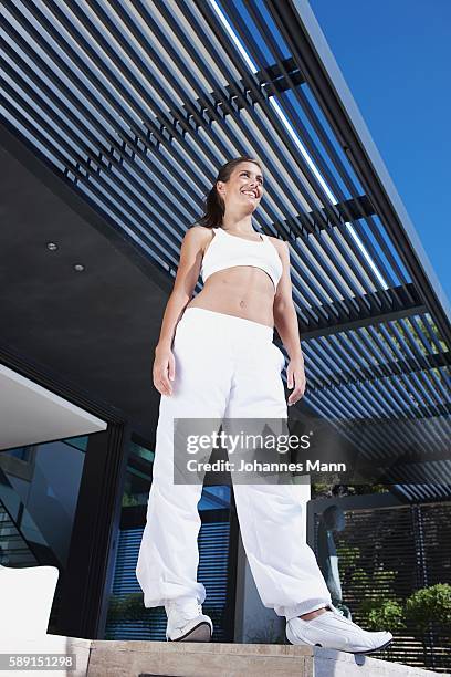 woman standing on deck - lifestyle mann portrait stock pictures, royalty-free photos & images