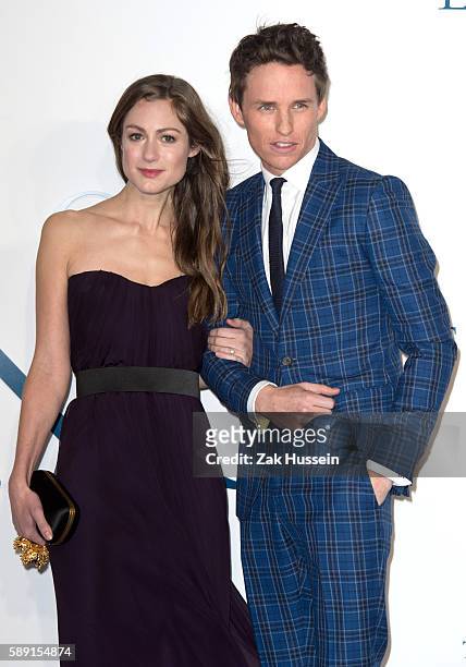 Eddie Redmayne and fiancee Hannah Bagshawe arriving at the UK premiere of "The Theory of Everything" at the Odeon Leicester Square in London.