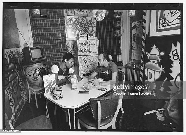 Artist Keith Haring in his apartment with boyfriend Juan Dubose.