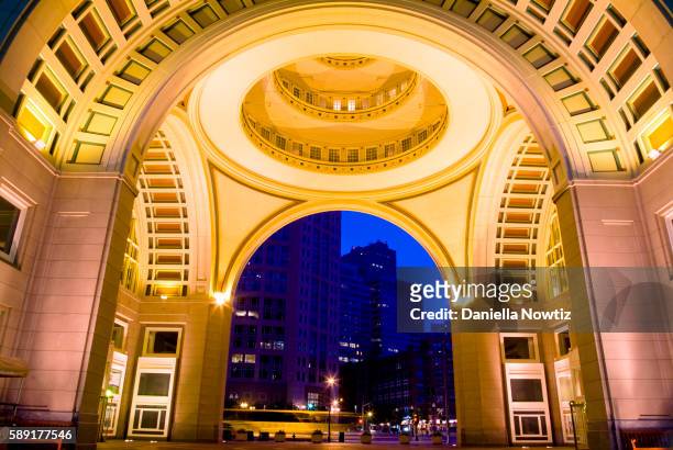 rowes wharf arch at twilight - rowe's wharf stock pictures, royalty-free photos & images
