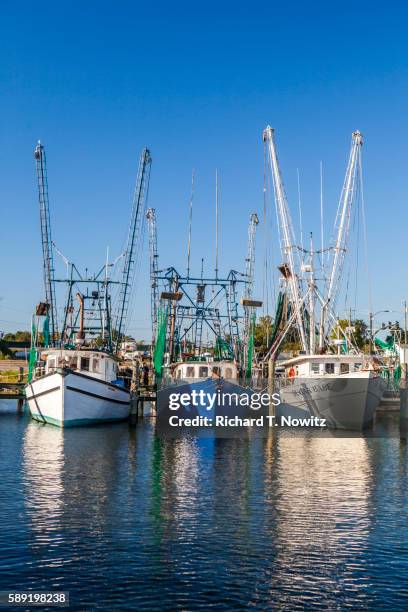 shrimp boats in bay st. louis - bay st louis stock pictures, royalty-free photos & images