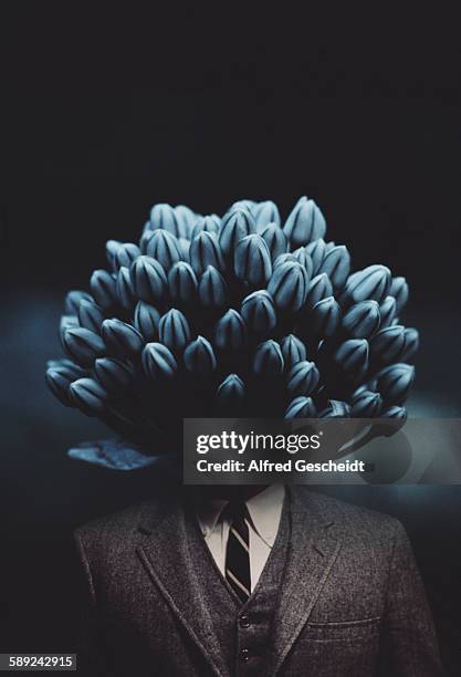 Man with a large flower for a head, 1984.