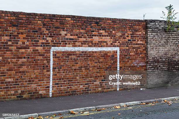 painted goal - street football stock-fotos und bilder
