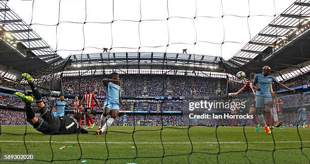 The ball evades Sunderland keeper Vito Manonne for Paddy NcNair to head an own goal for the second City goal during the Premier League match between...