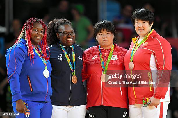 Silver medalist Idalys Ortiz of Cuba, gold medalist Emilie Andeol of France, bronze medalists Kanae Yamabe of Japan and Song Yu of China pose on the...