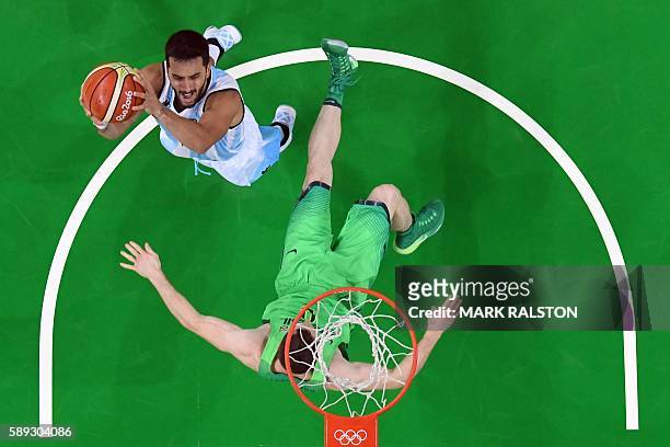 Argentina's point guard Facundo Campazzo goes to the basket during a Men's round Group B basketball match between Argentina and Brazil at the Carioca...
