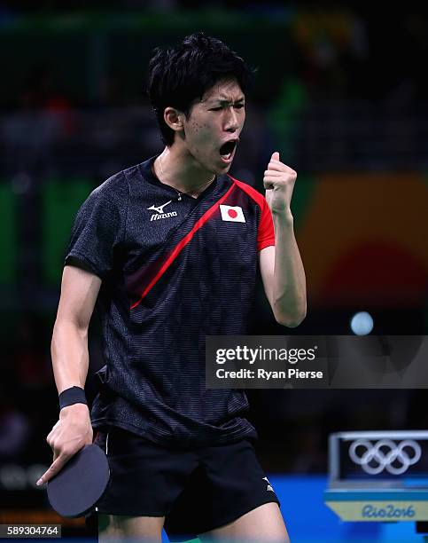 Maharu Yoshimura of Japan celebrates during the Table Tennis Men's Team Round One Match between Japan and Poland during Day 8 of the Rio 2016 Olympic...