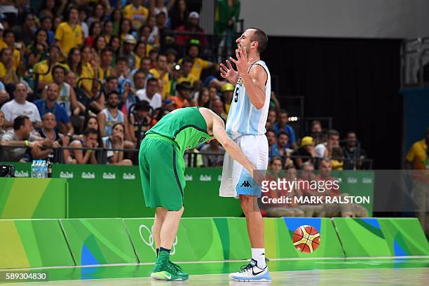 Argentina's shooting guard Manu Ginobili reacts after fouling Brazil's point guard Marcelinho Huertas in the last seconds of a Men's round Group B...