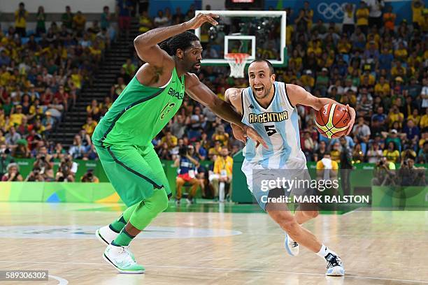 Argentina's shooting guard Manu Ginobili works around Brazil's centre Nene Hilario during a Men's round Group B basketball match between Argentina...