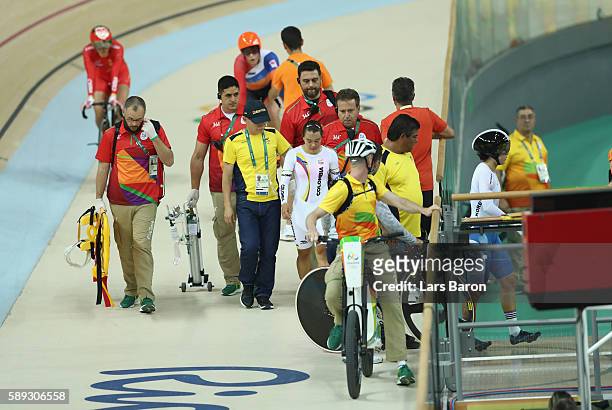 Martha Bayona Pineda of Colombia is seen after crashing out in the Women's Keirin Second round heat 1 on Day 8 of the Rio 2016 Olympic Games at the...