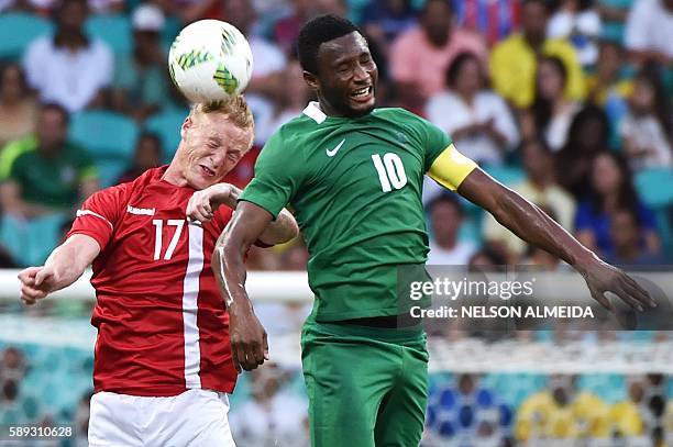 Jens Jonsson of Denmark vies for the ball with John Obi Mikel of Nigeria during the Rio 2016 Olympic Games mens quarter-final football match Nigeria...