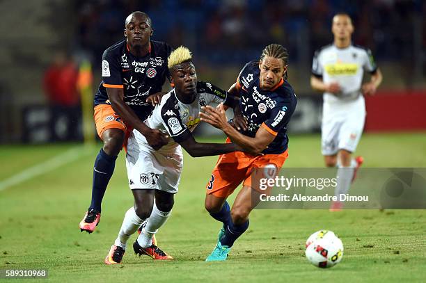 Jerome Roussillon of Montpellier and Nicolas Pepe of Angers and Daniel Congre of Montpellier during the football Ligue 1 match between Montpellier...