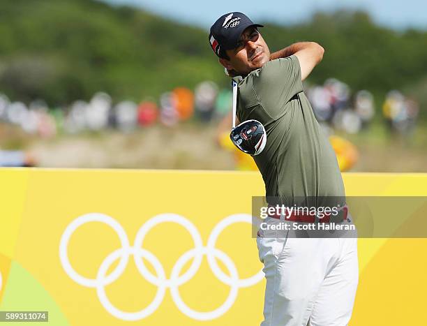 Felipe Aguilar of Chile hits his tee shot on the ninth hole during the third round of the golf on Day 8 of the Rio 2016 Olympic Games at the Olympic...