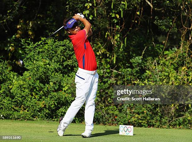 Shingo Katayama of Japan hits a tee shot on the 11th hole during the third round of the golf on Day 8 of the Rio 2016 Olympic Games at the Olympic...