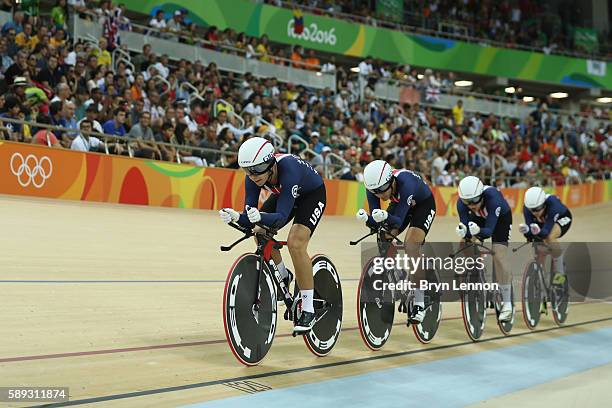 Sarah Hammer, Kelly Catlin, Chloe Dygert and Jennifer Valente of the United States compete in the Women's Team Pursuit Final for the Gold medal on...