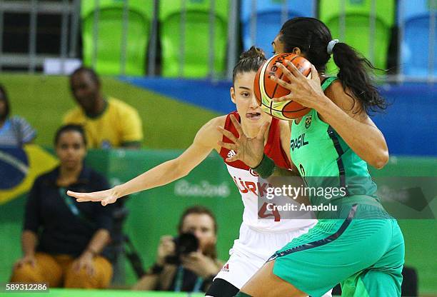 Olcay Cakir of Turkey in action against Iziane Castro of Brazil during a Women's Group A game between Turkey and Brazil at the Rio 2016 Olympic Games...