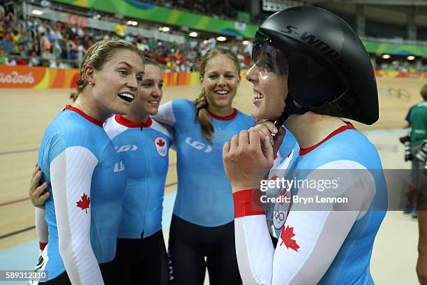 Allison Beveridge, Jasmin Glaesser, Kirsti Lay and Georgia Simmerling of Canada celebrate winning the bronze medal after the Women's Team Pursuit...