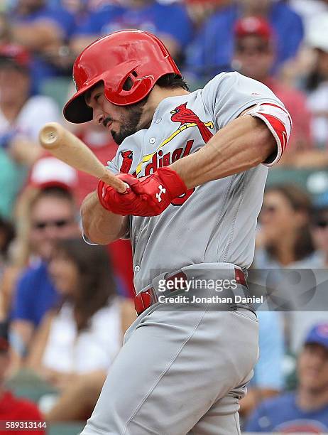 Randal Grichuk of the St. Louis Cardinals hits a grand slam home run in the 8th inning against the Chicago Cubs at Wrigley Field on August 13, 2016...