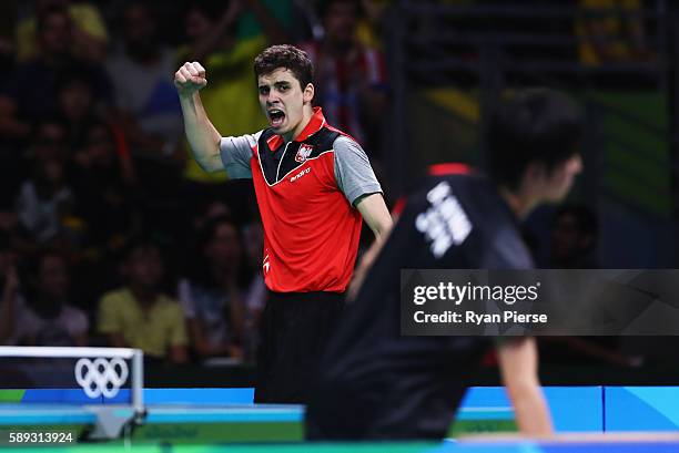 Jakub Dyjas of Poland celebrates during the Table Tennis Men's Team Round One Match between Japan and Poland during Day 8 of the Rio 2016 Olympic...