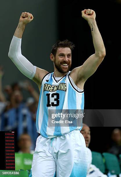 Andres Nocioni of Argentina celebrates the 111-107 double overtime win over Brazil during the Men's Preliminary Round Group B match on day 8 of the...