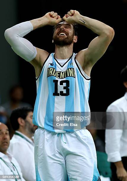 Andres Nocioni of Argentina celebrates the 111-107 double overtime win over Brazil during the Men's Preliminary Round Group B match on day 8 of the...