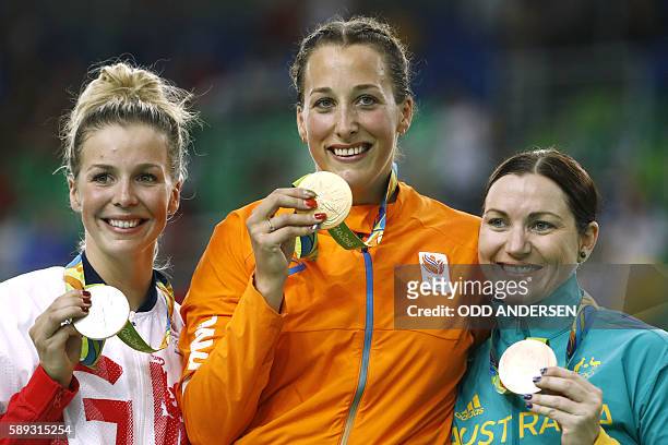 Silver medallist Britain's Rebecca James, gold medallist the Netherlands' Elis Ligtlee and bronze medallist Australia's Anna Meares pose with their...