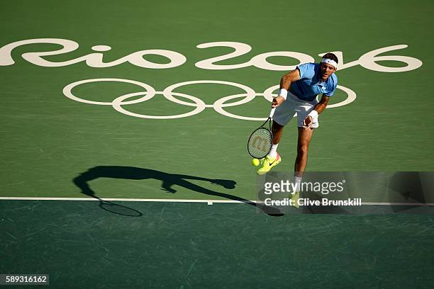 Juan Martin Del Potro of Argentina serves to Rafael Nadal of Spain during the Men's Singles Semifinal Match on Day 8 of the Rio 2016 Olympic Games at...