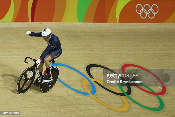 Jason Kenny of Great Britain celebrates winning the Men's Sprint semifinal Race 3 and qualifying for the gold medal final on Day 8 of the Rio 2016...