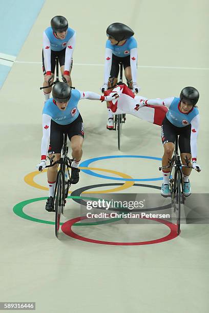 Allison Beveridge, Jasmin Glaesser, Kirsti Lay and Georgia Simmerling of Canada celebrate winning the bronze medal after the Women's Team Pursuit...