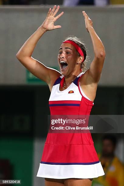 Monica Puig of Puerto Rico reacts after defeating Angelique Kerber of Germany in the Women's Singles Gold Medal Match on Day 8 of the Rio 2016...