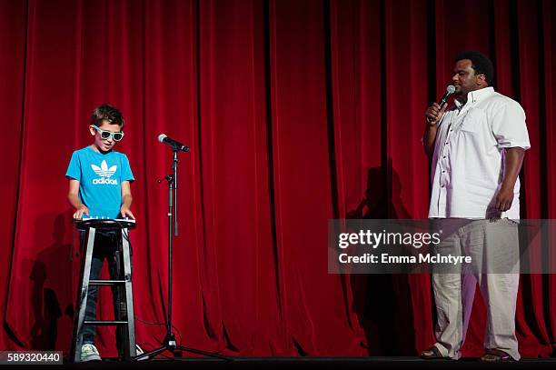 Marco Ruedas and actor Craig Robinson speak onstage at the Sundance Next Fest premiere of 'Morris From America' and youth talent show at The Theatre...