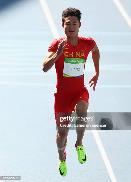 Peimeng Zhang of China competes in the Men's 100 metres heats on Day 8 of the Rio 2016 Olympic Games at the Olympic Stadium on August 13, 2016 in Rio...