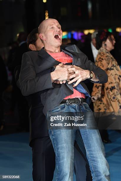 Hugh Jackman and Eddie Edwards arriving at the European premiere of Eddie the Eagle at the Odeon Leicester Square in London