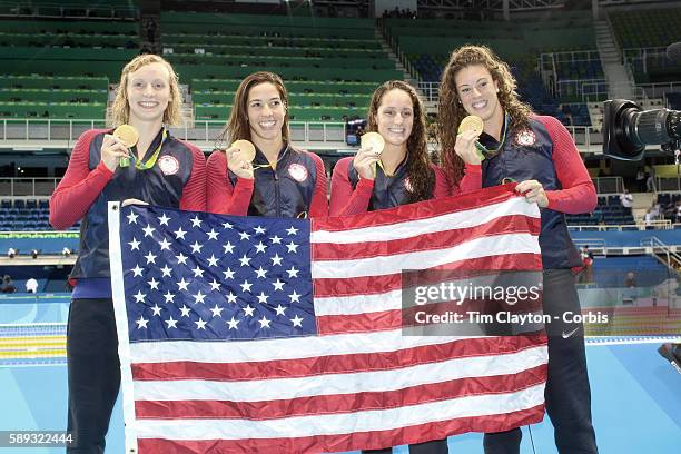 Day 5 The United States Women's 4 x 200m Freestyle Relay team of, left to right, Allison Schmitt, Leah Smith, Maya Dorado and Katie Ledecky with...