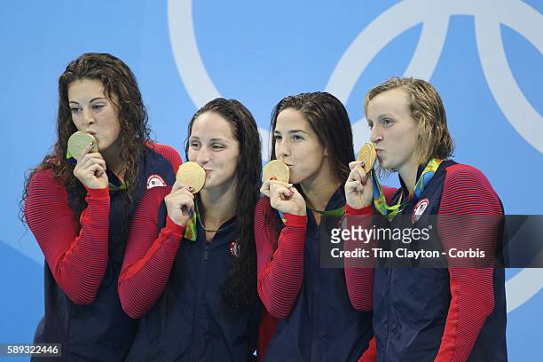 Day 5 The United States Women's 4 x 200m Freestyle Relay team of Allison Schmitt, Leah Smith, Maya Dorado and Katie Ledecky with their gold medals...