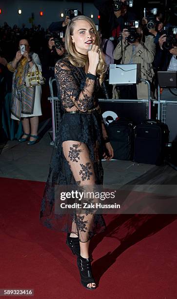 Cara Delevingne arriving at the GQ Men of the Year Awards at the Royal Opera House in London