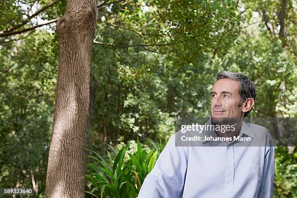 man in forest - portrait mann business stock pictures, royalty-free photos & images