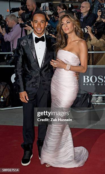 Lewis Hamilton and Nicole Scherzinger arriving at the GQ Men of the Year Awards at the Royal Opera House in London