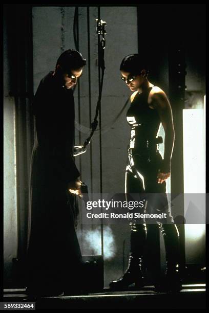 Keanu Reeves and Carrie-Anne Moss in The Matrix.