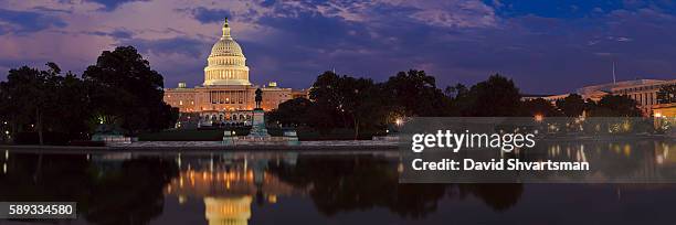 the u.s. capitol building in washington, dc and reflection pool at night - dc skyline stockfoto's en -beelden