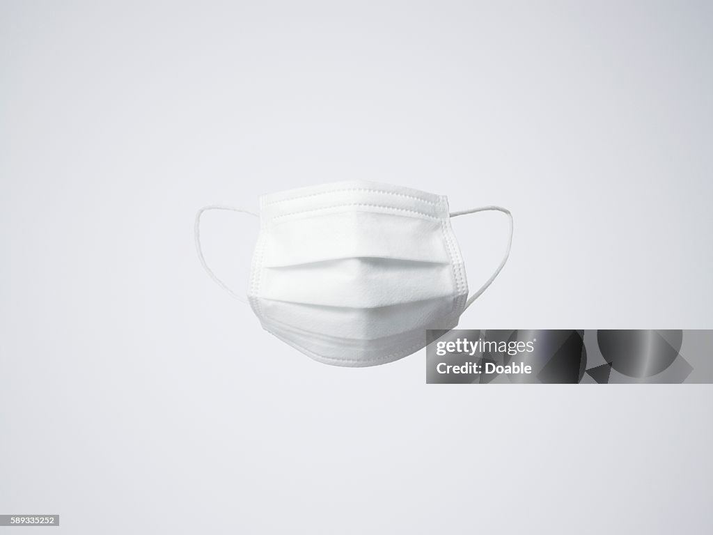 One white surgical mask