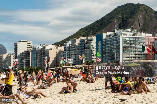 people on the beach - olimpiadas stock pictures, royalty-free photos & images