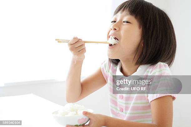 1,674 Kids Eating Rice Stock Photos, High-Res Pictures, and Images ...