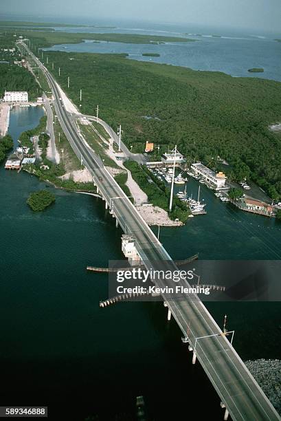 aerial view of bridge and highway connecting the florida keys - monroe county florida stock pictures, royalty-free photos & images